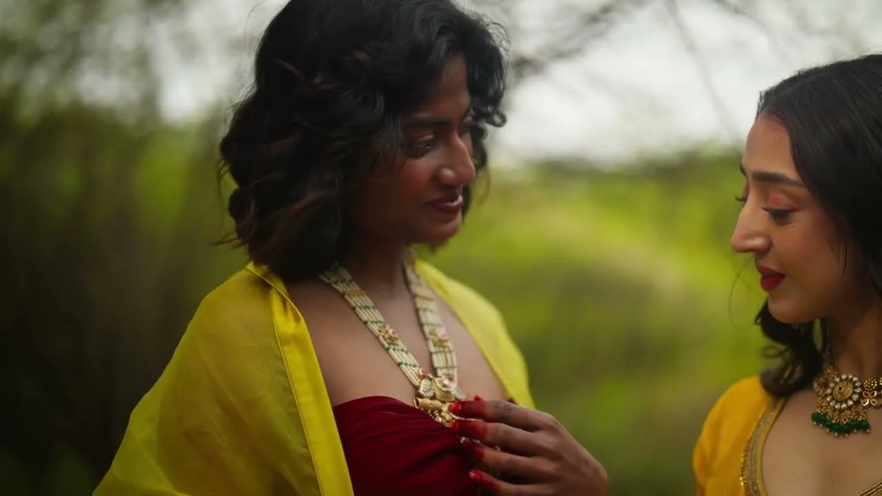 Two women in yellow, outdoors