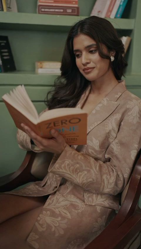 Woman reading in the armchair