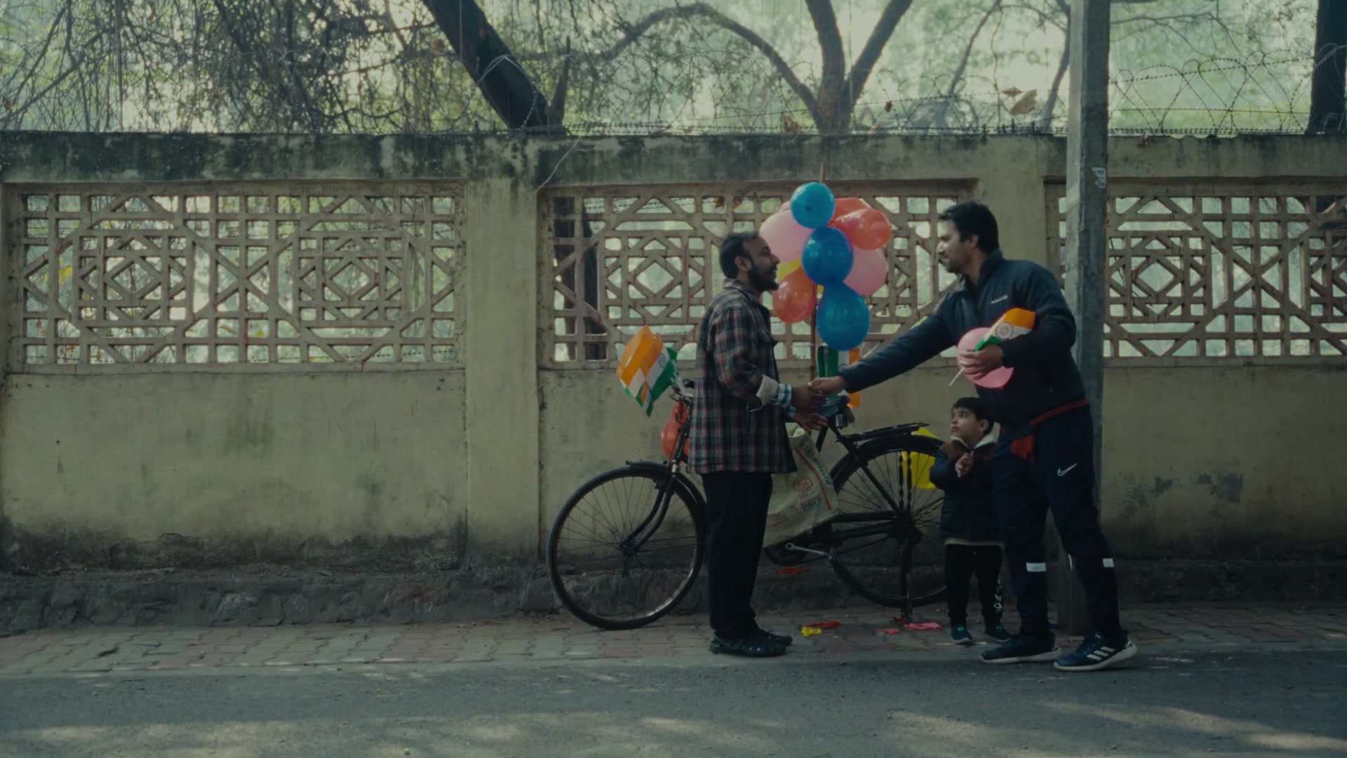 Wide of the balloon seller's cycle on the street