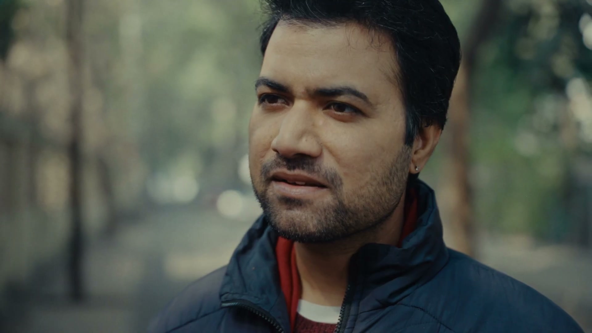 Man in a blue jacket, close-up