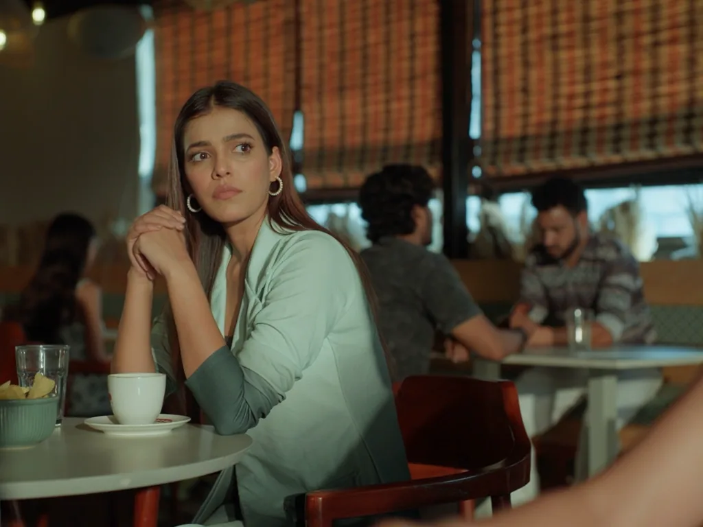Frame from Zykaz Cafe, at 0:15